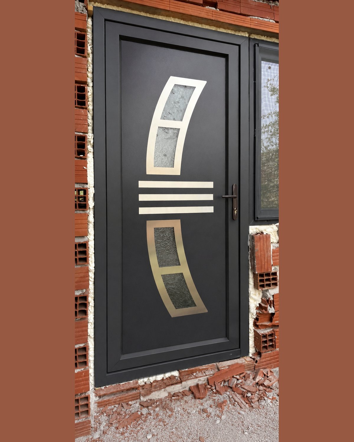 Close-up of SK14F in anthracite with champagne-gold stainless and textured glass on site