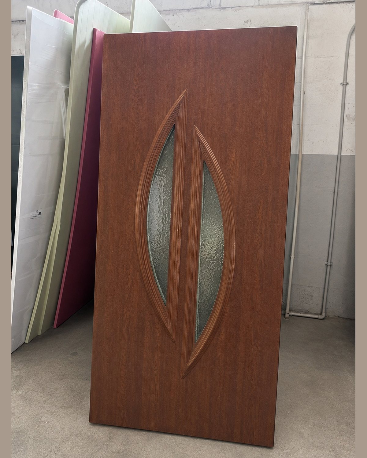 SK20T panel in mahogany leaning against the wall in the workshop