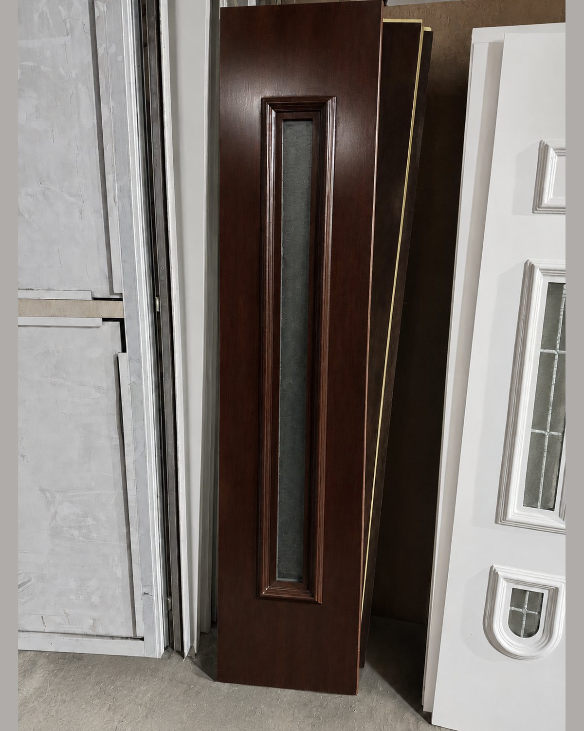 Narrow mahogany sidelight for the SK20T model, photographed in the workshop