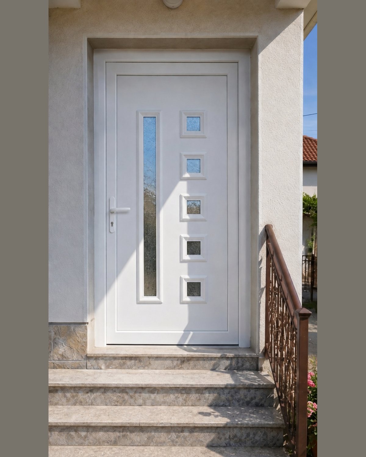 White SK24T panel on a sunlit house entrance with stone steps and railing