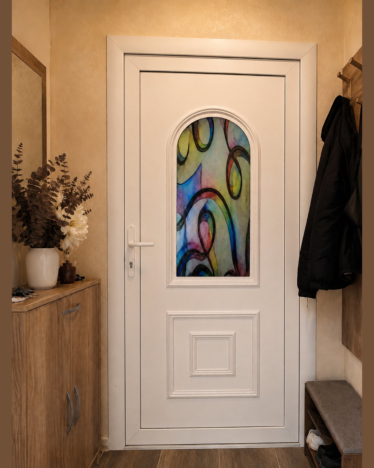 SK31T with coloured stained glass fitted into a white front door in a home hallway
